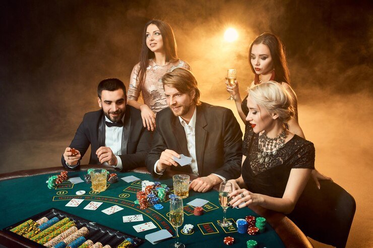 poker-players-sitting-around-table-casino-poker-gambling-casino_639032-1737